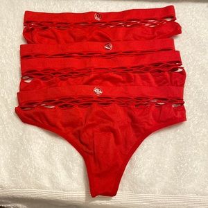 Brand new red thongs 1 pack 4 pieces. M